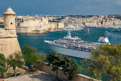 Cruise ship sailing along the grand harbor in malta. 