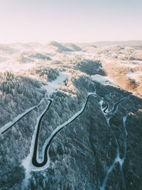 Scenic view of snow covered mountain against sky