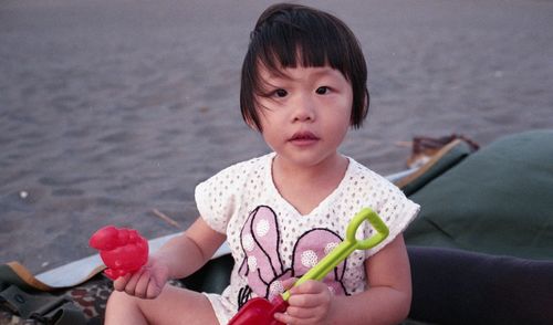 Portrait of girl relaxing at beach