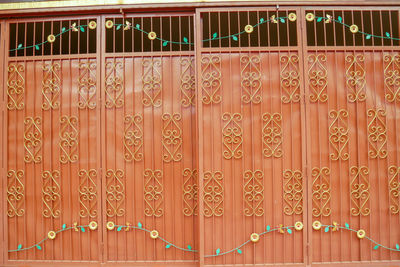 Low angle view of decoration hanging on wall in building