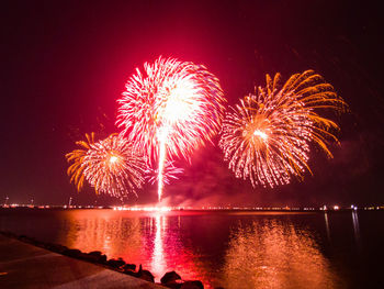 Firework display at night