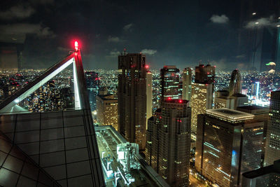 Illuminated cityscape at night