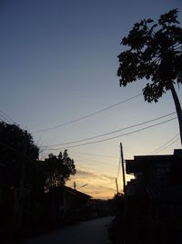 Built structure against sky at sunset