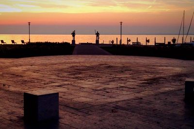 Scenic view of sea against sky at sunset