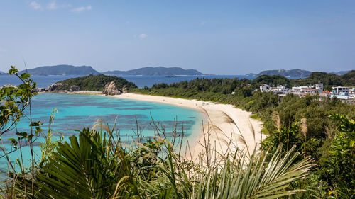 Scenic view of sea against clear blue sky