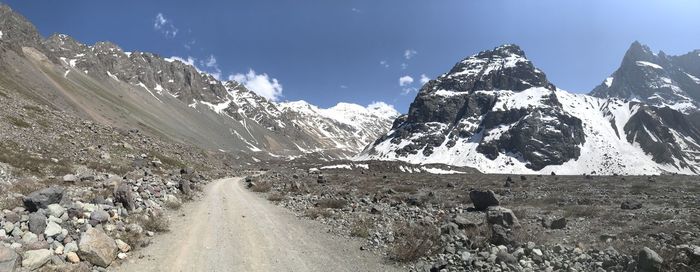 Panoramic view of snowcapped mountains against sky