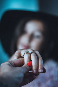 Cropped image of woman holding hand