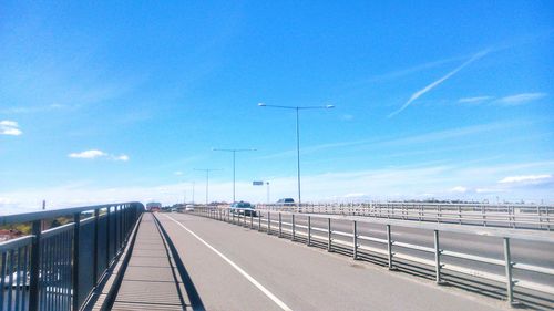 View of road against blue sky