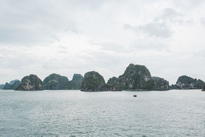 Scenic view of bay against sky