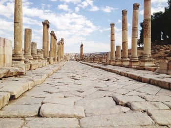 View of colonnade against sky