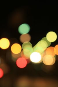 Defocused image of illuminated christmas lights