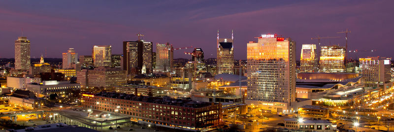 Illuminated cityscape at night