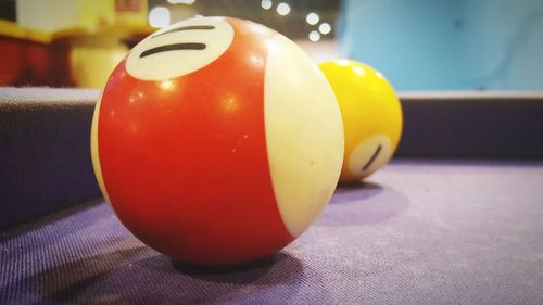 Close-up of multi colored ball on table