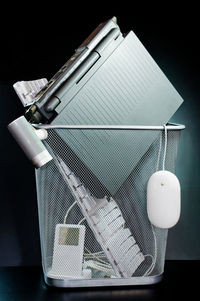 Close-up of electric lamp against black background