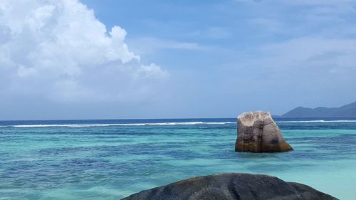 View of rock formations in sea