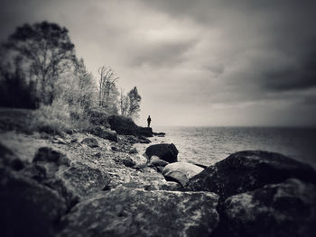 Scenic view of sea against cloudy sky