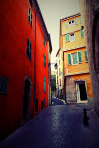 Narrow alley along buildings