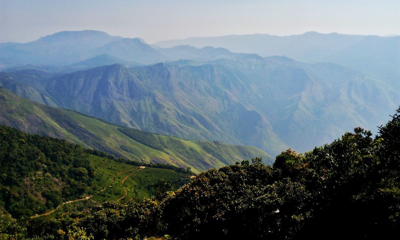 mountain, beauty in nature, nature, scenics, tranquility, tranquil scene, mountain range, idyllic, landscape, no people, day, outdoors, tree, sky