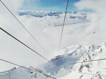 Low angle view of snow covered mountain against sky seegrube innsbruck