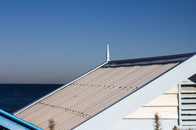 Low angle view of building against blue sky