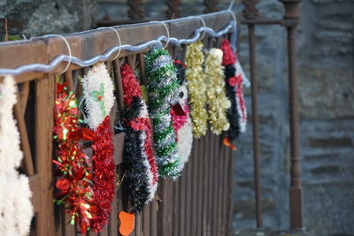 Close-up of clothes drying against wall in building