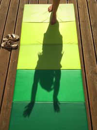 Low section of woman on tiled floor