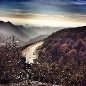 Scenic view of landscape against sky during sunset