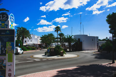 Road in city against sky