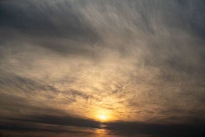 Low angle view of dramatic sky during sunset