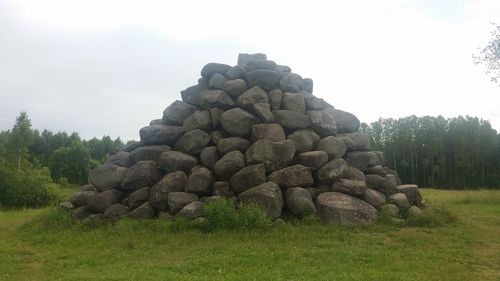 Stack of stones on grass