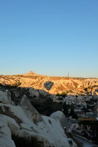 Scenic view of landscape against clear blue sky