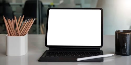 Close-up of laptop on table