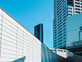 Low angle view of skyscrapers against sky