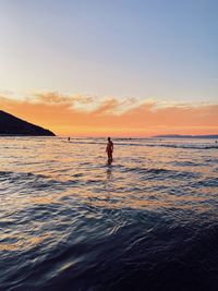 Scenic view of sea against sky during sunset