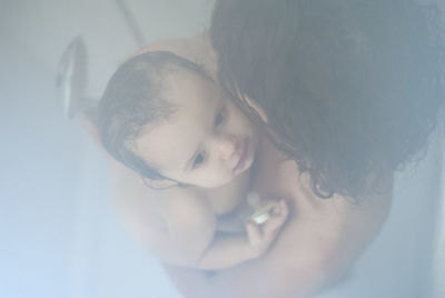 Close-up of mother and daughter