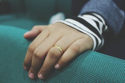 Cropped image of man wearing ring