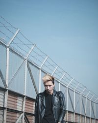 Portrait of young man outdoors