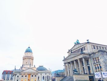 Historic gendarmenmarkt buildings against sky