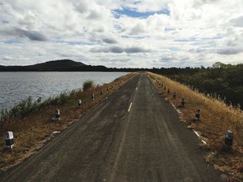 Panoramic view of empty road against sky