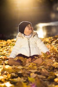 Woman sitting on snow