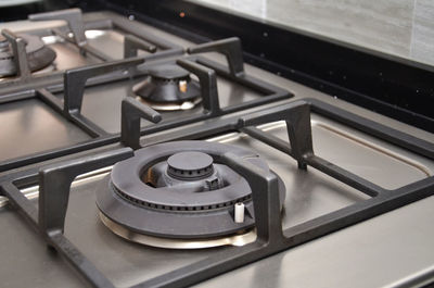 Close-up of gas stove in kitchen