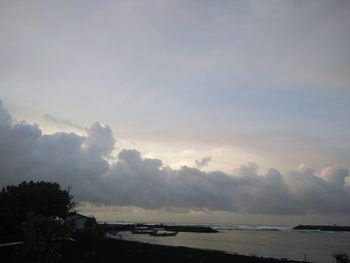 Scenic view of sea against sky at sunset