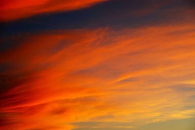 Low angle view of dramatic sky at sunset