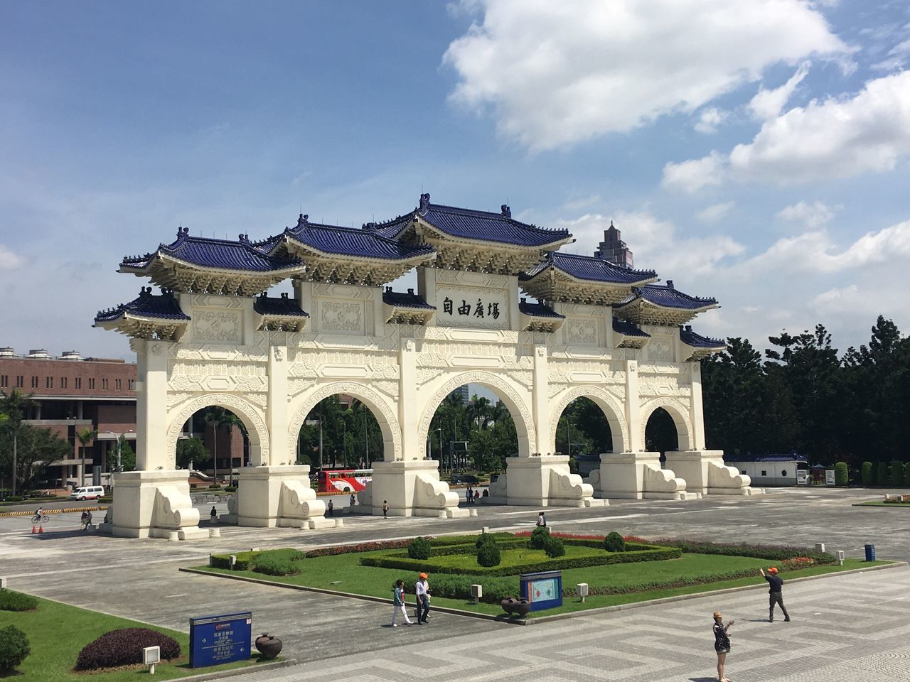 FACADE OF BUILDING WITH CLOUDS