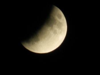 Low angle view of moon against sky at night
