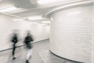 People walking in subway station