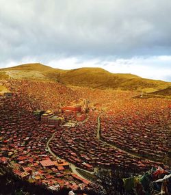 Scenic view of landscape against cloudy sky