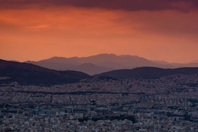 Scenic view of mountains against sky during sunset