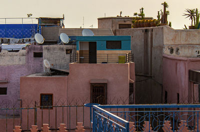 Colorful historical buildings in the old medina jewish quarter in marrakech, morocco, africa. 