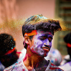 Close-up of man with powder paint